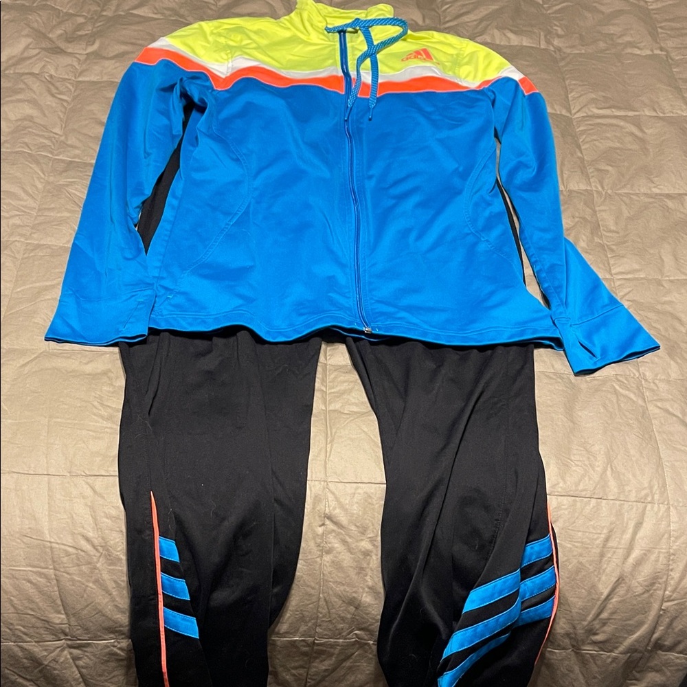 Adidas women’s neon and black vintage track suit